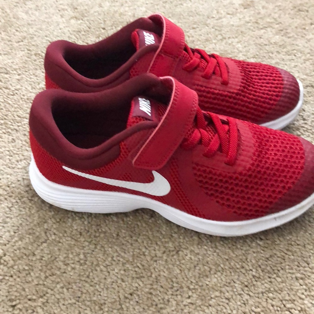 Brand new red Nike sneakers